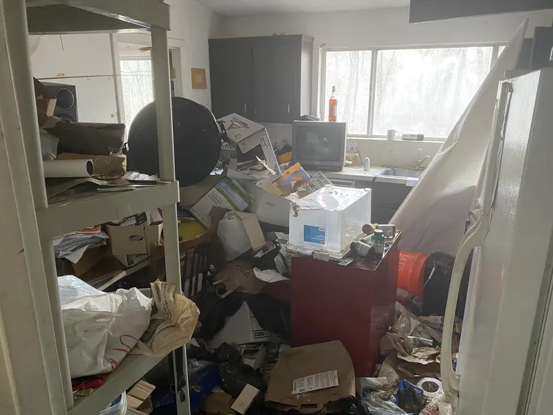 Office space with accumulated clutter and papers